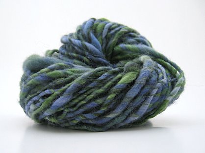 Single ply yarn spun from handdyed roving.