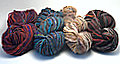 Noro Big Kureyon in colors #1, #12, #7, and #19 (from left to right).