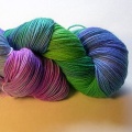 KnitPicks sock yarn in blue, green, and purple.