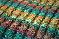 Knit ridges and dropped stitches.