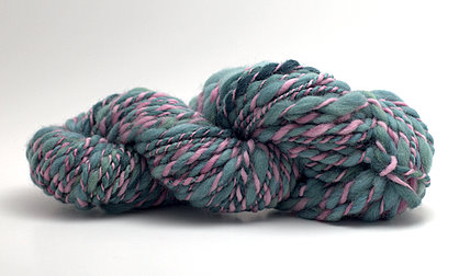 Teal and pink 2-ply handspun yarn.