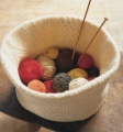 This is the original knitting basket image from the Martha Stewart Living website. It is made from a deconstructed felted wool sweater. <em>Image from Martha Stewart Living</em>.