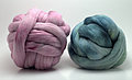 Pink and teal rovings dyed using acid dyes.
