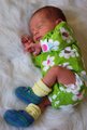 These wee booties are still a little big for tiny preemie Serena.
